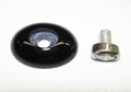 Photo of an oval black Onyx cabochon which has an oval diamond tube counter-sunk in the center of the cabochon.