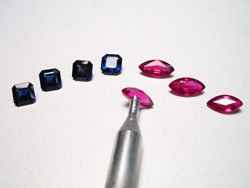 Picture a ring with a star pattern made of Rubies and Sapphires.