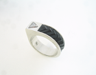 Small pic a ring with a carved black jade inlay.
