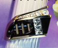 Small photo of a ring with a Black Jade and 3 gold bars with square diamonds.