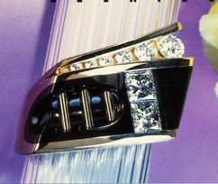 Large ring inlaid with black jade with princess cut diamonds set in the Black jade.
