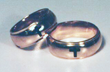 Small photo of 2 rings with cross shaped Onyx inlays.