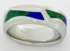 Photo of a platinum ring with blue Lapis and green Maw Sit Sit Jade inlays.