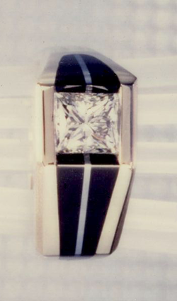 Ring inlaid with Black Jade and a narrow stripe of silvery Silicon.