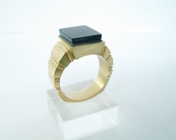 Photo of the ring with the Black Jade glued in the ring.