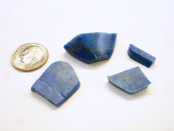 Photo of some pale blue Lapis rough material.