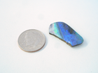A Boulder Opal which is broken and needs to be repaired.s