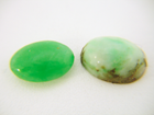 Photo of 2 Jadeite cabochons which are scratched and need to be re-polished.