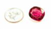 Photo of a pink gem before re-polishing.