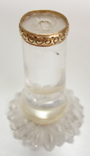 Shows a views of a 4 inch tall Quartz carving in the shape of a daisy flower at the top. It is broken in 2 places.