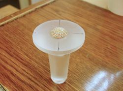 I have set a dome shaped gold piece with pave' diamonds into the recessed area to see if it fits properly.