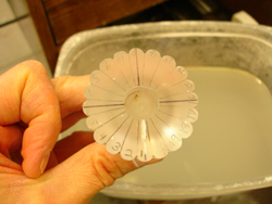 I am now using a pencil to draw where the flower petals will be carved onto the top.