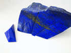 A faceted Lapis cabochon.