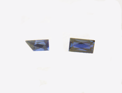 Shows the two finished tiny Sapphires. One is rectangular and the other is rectangular with a diagonal edge.