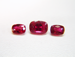 Photo of 3 cushion shaped Rubies.