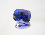 Photo of a cushion shaped blue Tanzanite.