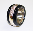 A platinum band inlaid 360 degrees around with Black Jade.