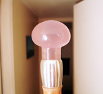 Photo of a rose Quartz cane handle.