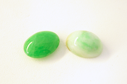 2 green Jadeite cabochons which now have a high polish on top.