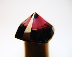 Photo of the same pink Tourmaline where the chip has now been repaired and looks like new. 