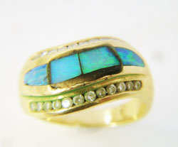 Photo of the ring showing how the 2 new pieces have been trimmed down.