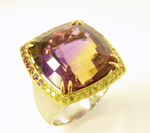 Photo of an Ametrine gemstone in the ring.